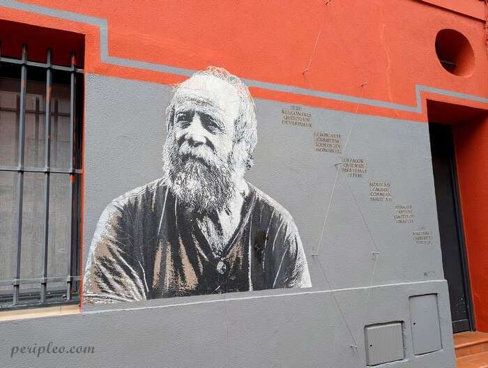 Street art Rue Isidore Girard à Montpellier, portrait monumental d’un homme barbu réalisé sur une façade du Quartier Méditerranée