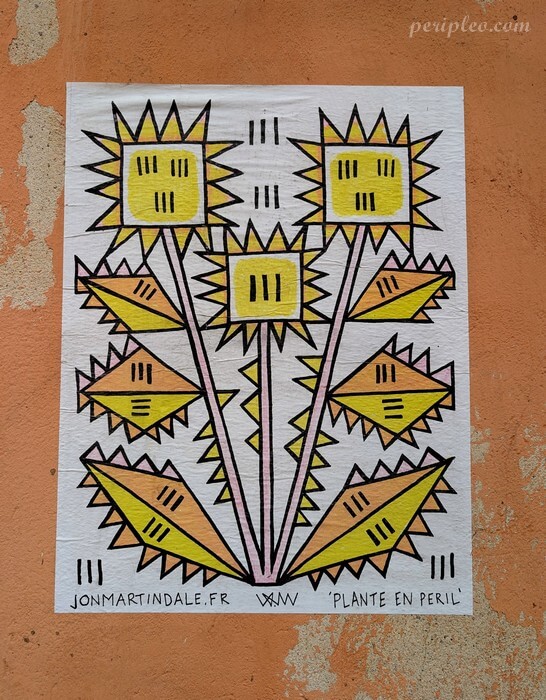Street art Rue de Lorraine à Montpellier, affiche artistique « Plante en péril » aux motifs géométriques colorés de Jon Martindale collée sur un mur du Quartier Méditerranée