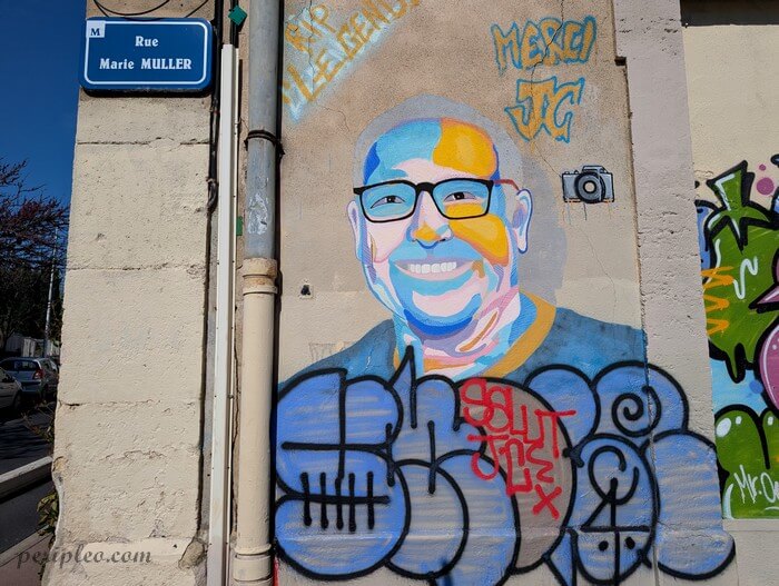 Street art Rue Marie Muller à Montpellier, portrait coloré en hommage à un habitant du Quartier  Méditerranée