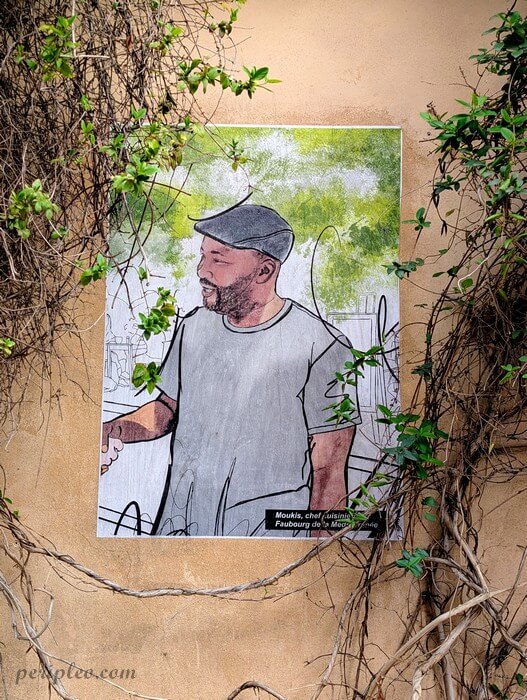 Street art Rue de la Méditerranée à Montpellier, portrait illustré d’un habitant du Faubourg de la Méditerranée intégré à un mur végétalisé du Quartier Méditerranée