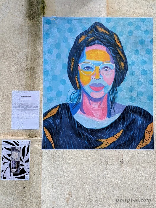 Œuvre de street art dans la Rue Méditerranée à Montpellier, portrait féminin multicolore peint sur une façade du Quartier Méditerranée