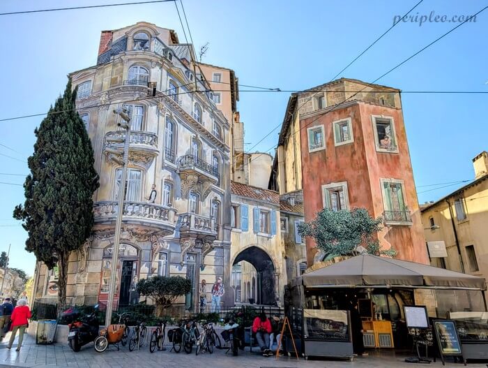 Fresque en trompe-l’œil Place Édouard Adam à Montpellier, façade artistique de Mad'Art Concept au cœur du centre historique sud