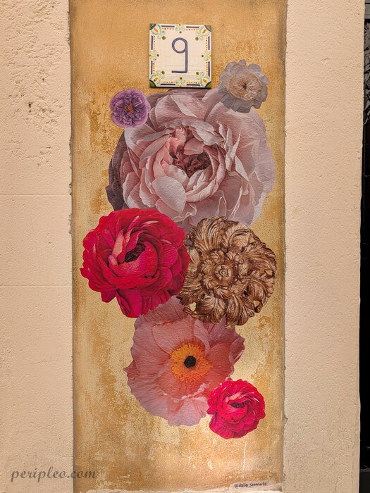 Street art Rue du Général Vincent à Montpellier, collage floral géant mêlant fleurs colorées et art urbain de l'Atelier Shamarée dans le centre historique sud